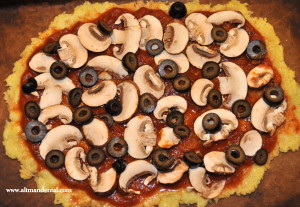 cauliflower pizza with mushrooms and olives