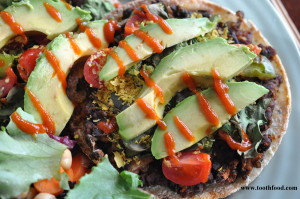 Vegan Mexican Pizzas Topped With Nutritional Yeast and Siracha