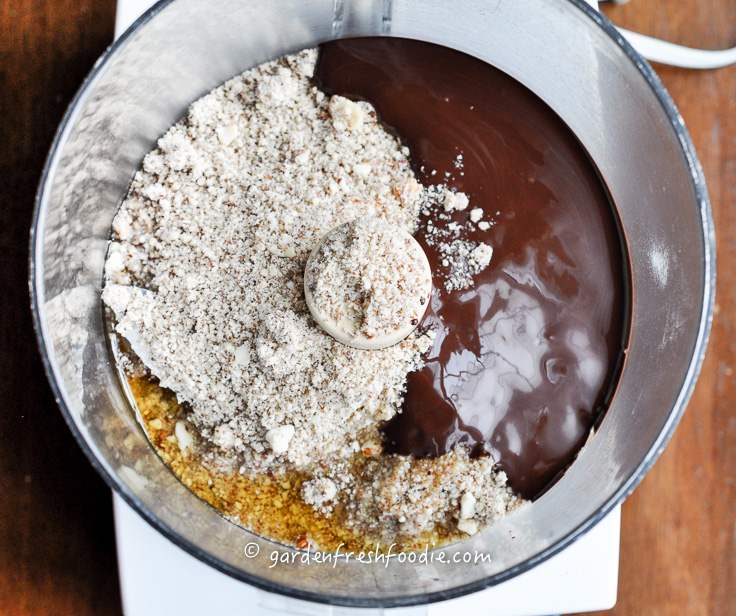 Mixing Chocolate Almond Pie Crust Ingredients