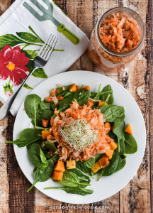 Quart of Ginger Carrot Kimchi With Fresh Alfalfa Sprouts