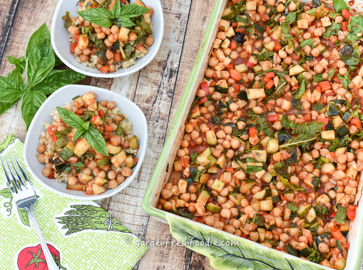 Bowls of Saucy Chickpeas WIth Zucchini and Fresh Greens and Basil