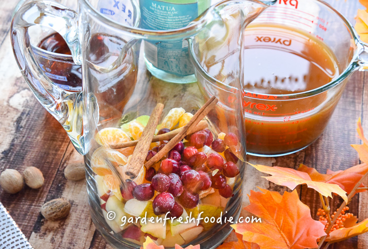 Placing Fruit For Apple Cider Sangria